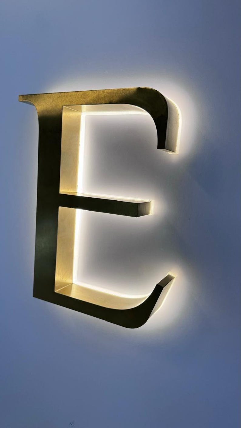 Custom Illuminated Aluminum Letter Sign: Green Powder Coat, Neon LED